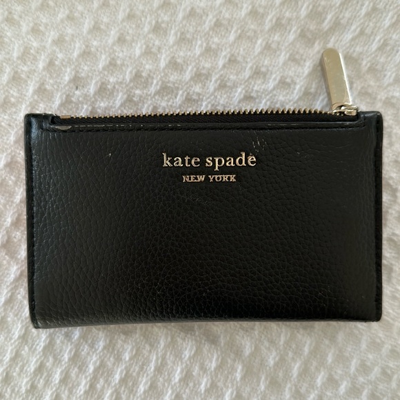 Kate Spade Small black leather wallet with pink liner. - Picture 1 of 6
